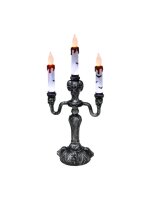 Kerzenständer mit Totenschädeln und blutenden...